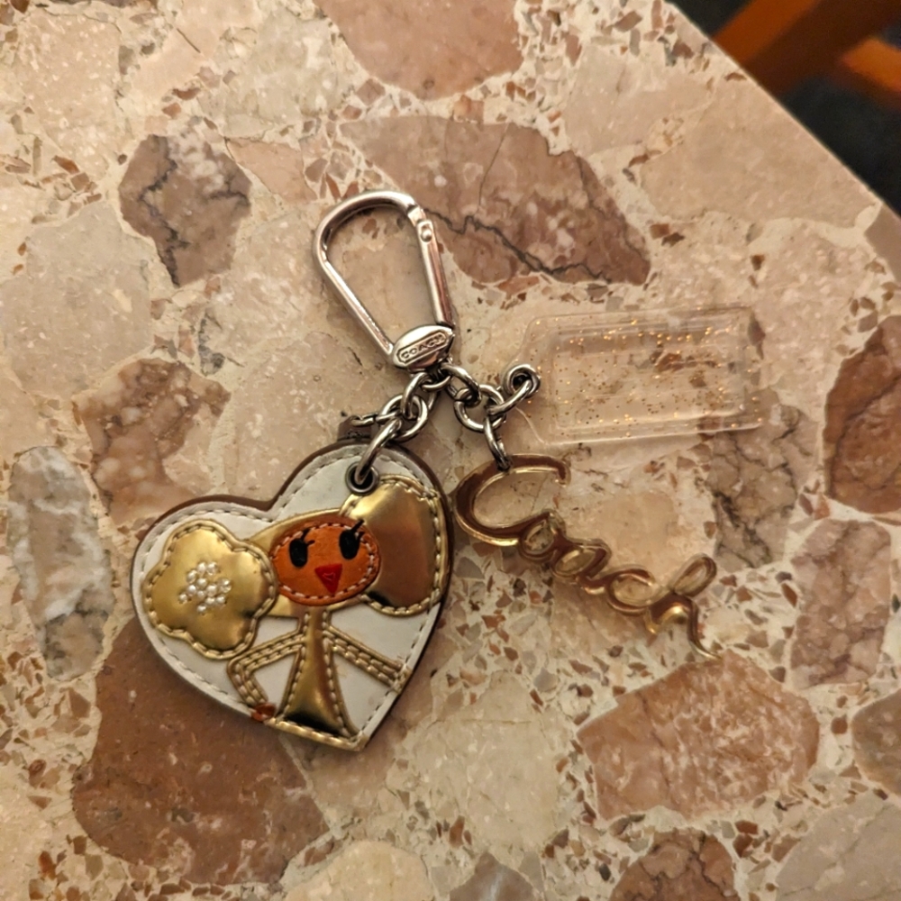 Coach Poppy keychain Goldie